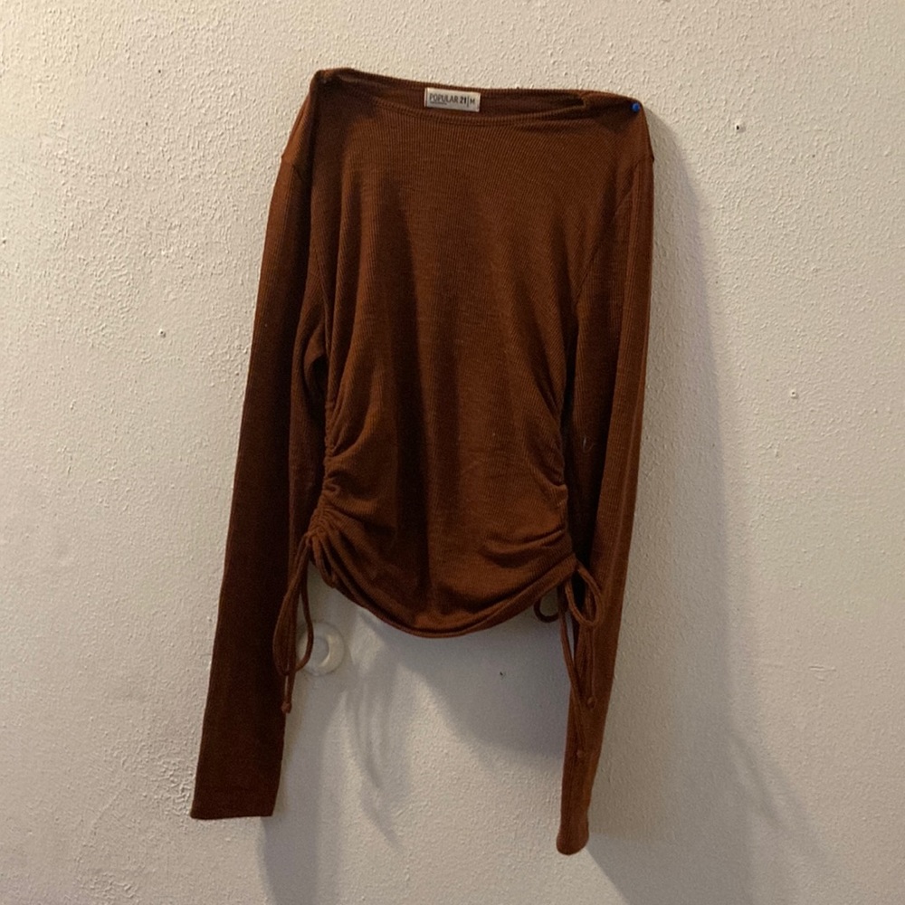 Medium nice brown long sleeve shirt beautiful for going outside or to the mall
